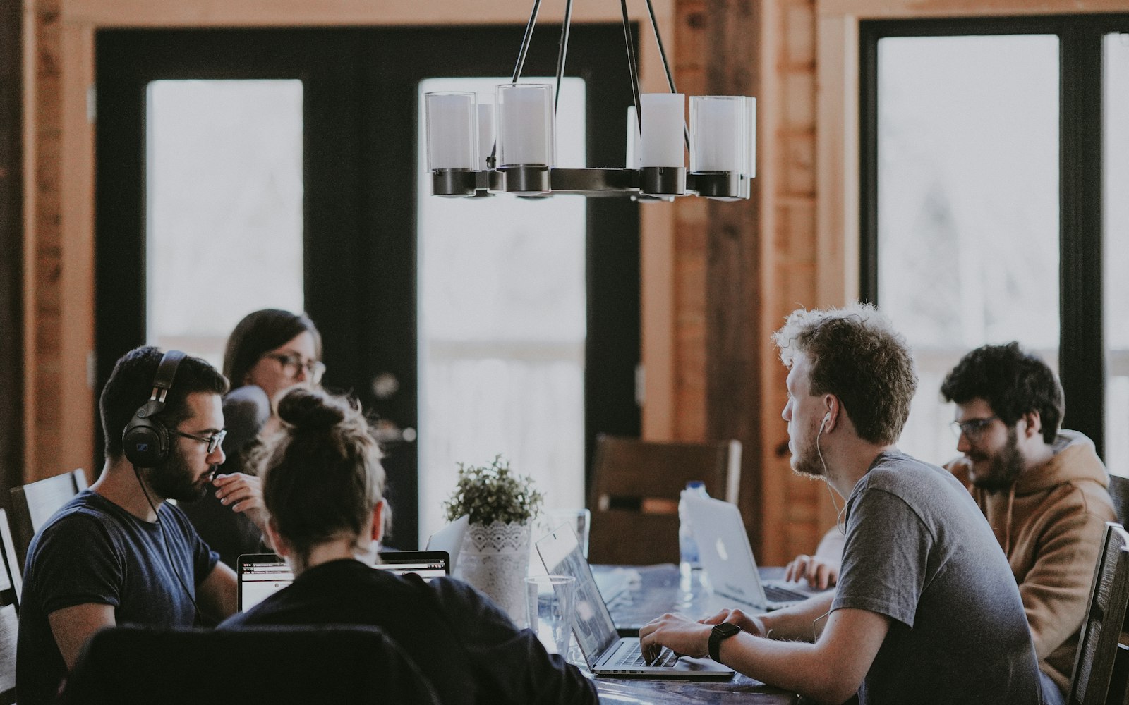 A team meeting around a long table